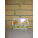 Bakke med blomster